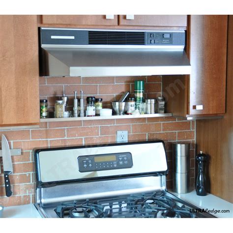 stainless steel shelf above stove